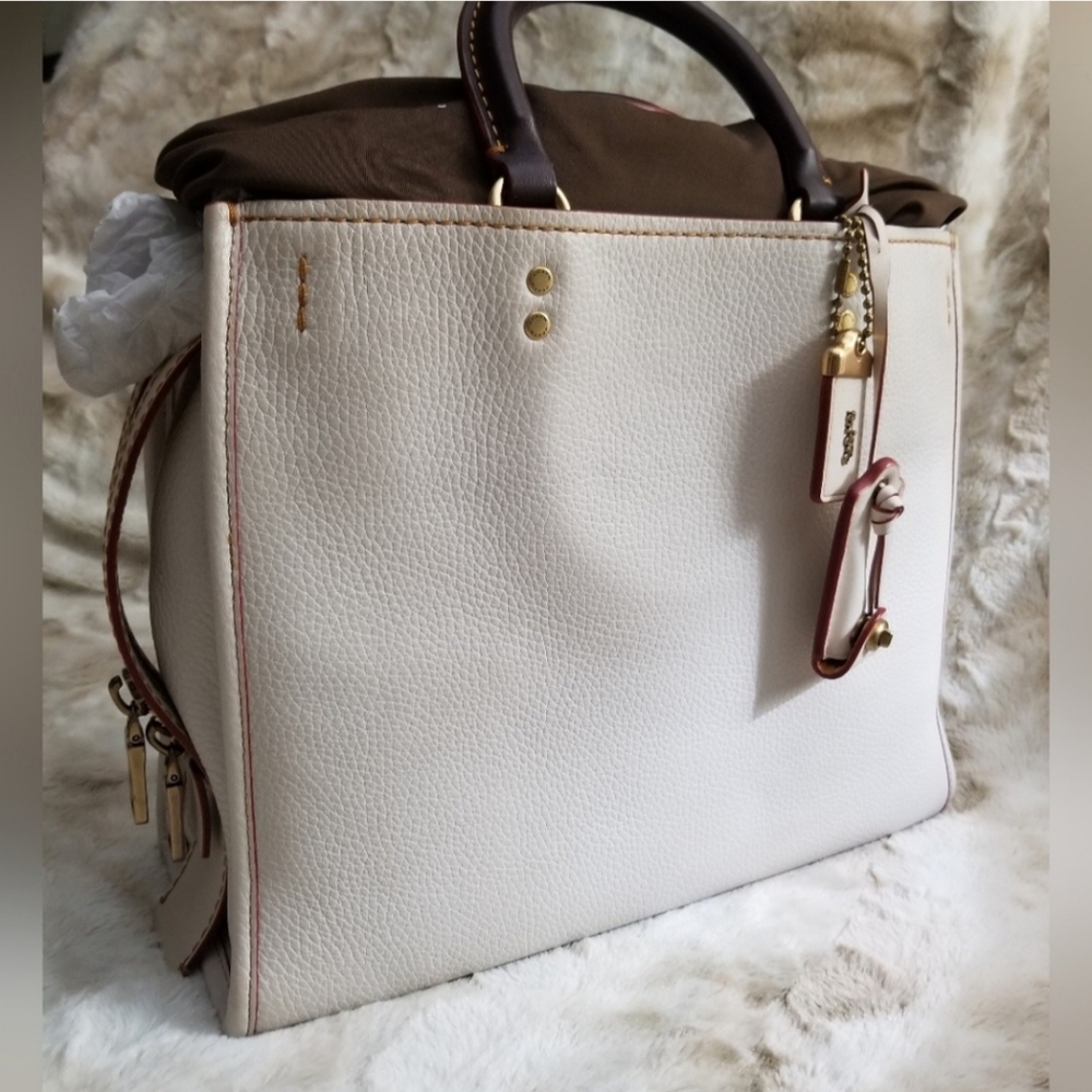 SOLD! Pebble Leather Coach Rogue